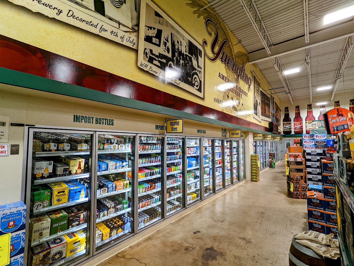 A store with shelves full of beer and other items.